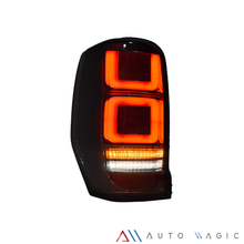 Load image into Gallery viewer, Calaveras L200 20-23 LED negras Performance