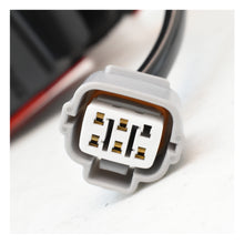 Cargar imagen en el visor de la galería, Calavera L200 20-24 Gls c/arnes c/Led izq.