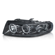 Cargar imagen en el visor de la galería, Faros Leon 99-06 c/lupa ojo de ángel Performance