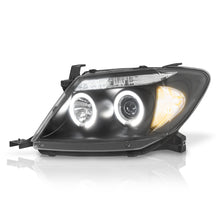 Cargar imagen en el visor de la galería, Faros Hilux 09-11 c/lupa ojo de ángel Performance