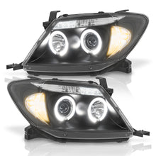Cargar imagen en el visor de la galería, Faros Hilux 09-11 c/lupa ojo de ángel Performance