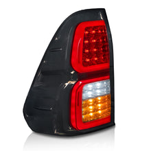 Load image into Gallery viewer, Calaveras Hilux 16-23 LED negras Performance