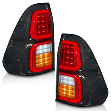 Load image into Gallery viewer, Calaveras Hilux 16-23 LED negras Performance