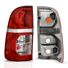 Load image into Gallery viewer, Calavera Hilux 12-15 c/arnes c/focos izq.