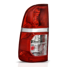 Load image into Gallery viewer, Calavera Hilux 12-15 c/arnes c/focos izq.