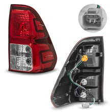 Load image into Gallery viewer, Calavera Hilux 16-24 s/arnes der.