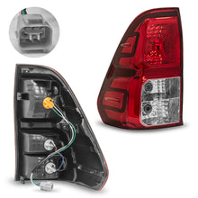 Load image into Gallery viewer, Calavera Hilux 16-24 s/arnes izq.