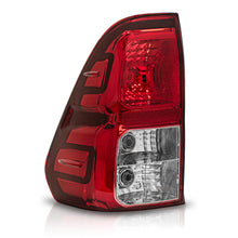 Load image into Gallery viewer, Calavera Hilux 16-24 s/arnes izq.